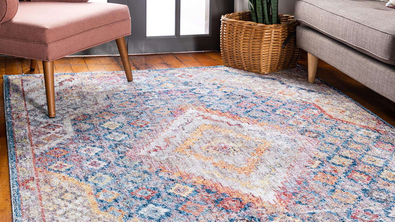 Room with colorful area rug