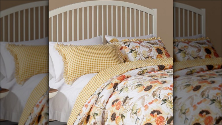 ruffled pillows on a bed