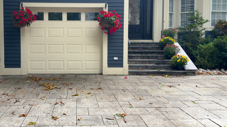 a patio and driveway with grand ashlar stamped concrete patterning