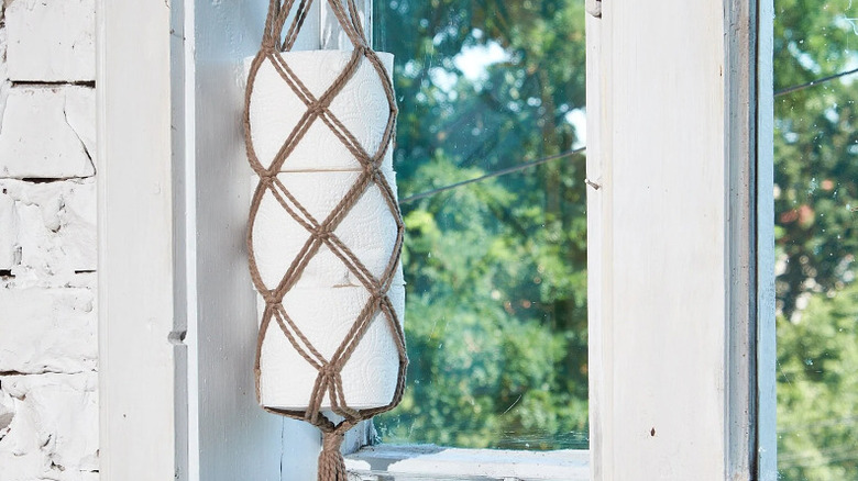 Toilet paper in macrame hanger