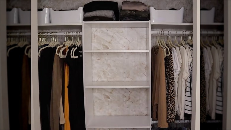 closet makeover with bookshelf and hang rods