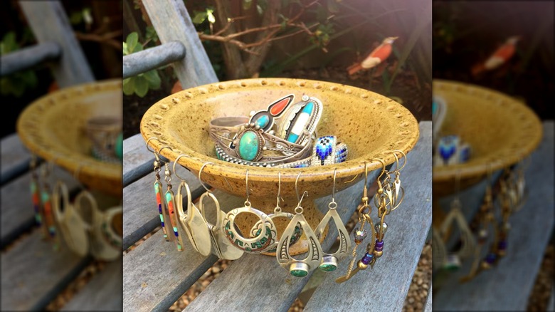 Decorative round jewelry bowl on a chair