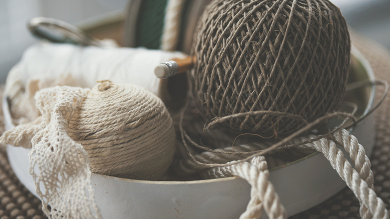 bowl with yarn and crafts on a desk