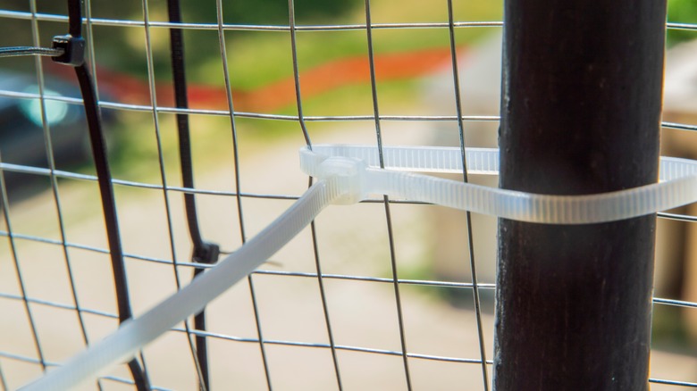 fence with zip tie