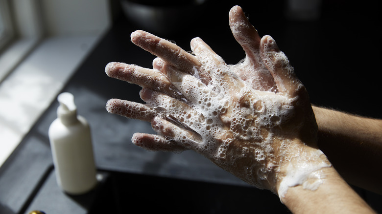 washing hands with soap