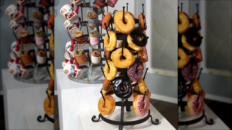 Donuts hanging on cup holder