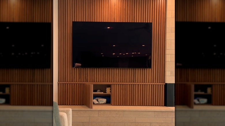 Indistinguishable cabinets in TV slat wall in a living room