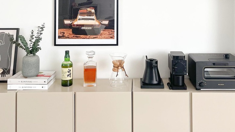 beige sideboard with coffee station