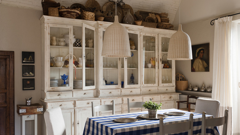 Kitchen with wicker light fixtures and baskets