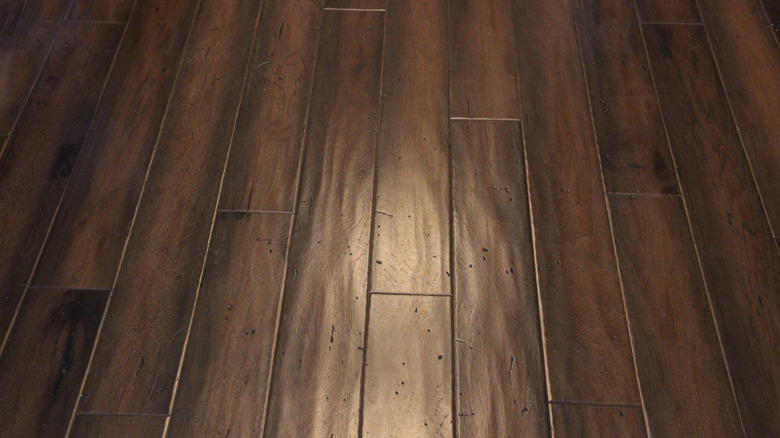 Dark brown hand-scraped wood flooring