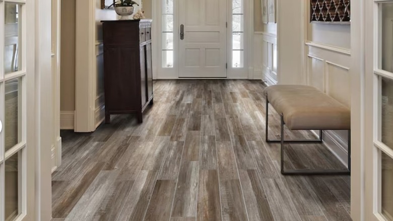 A hallway with wood-look tiles