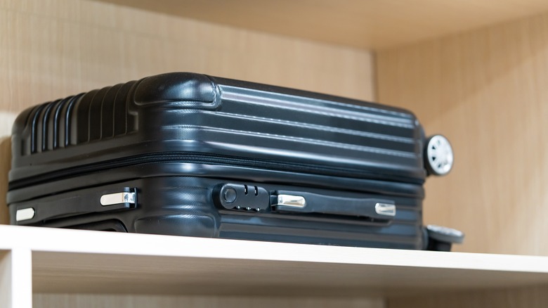 suitcase in closet