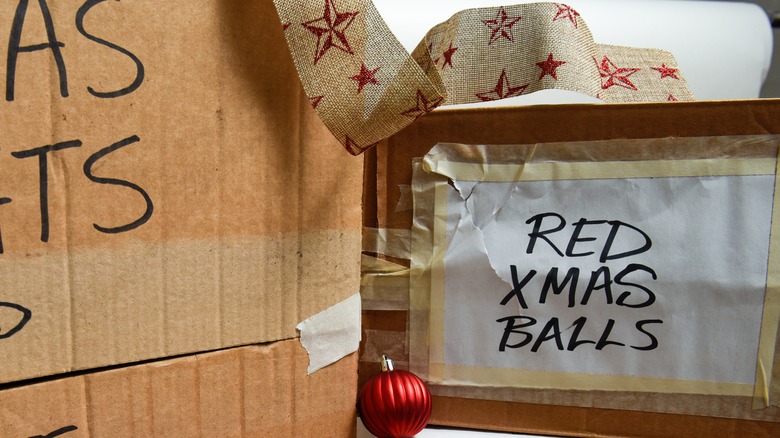 Boxes labeled with "Xmas lights" and "tree decorations"