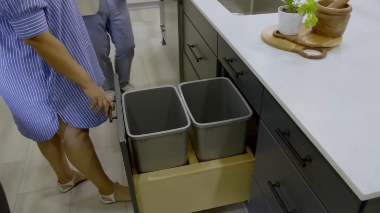 trash can in kitchen cabinet