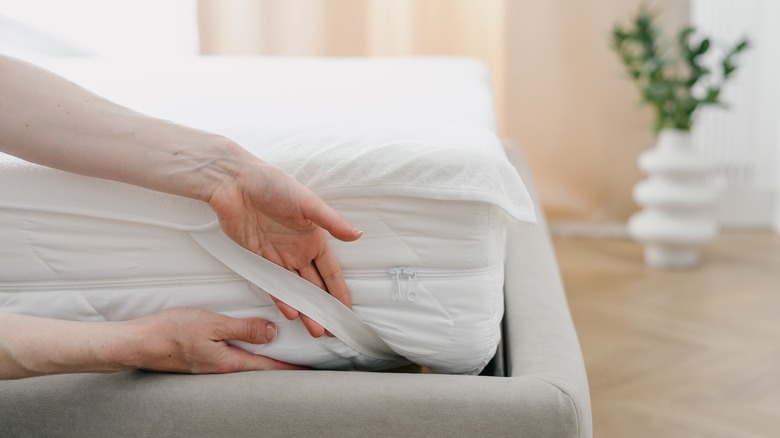 putting a topper on a mattress