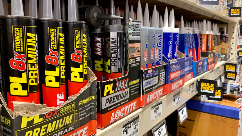 A retail display of Loctite construction adhesives