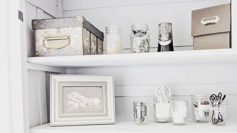 Office supplies stored in china cabinet