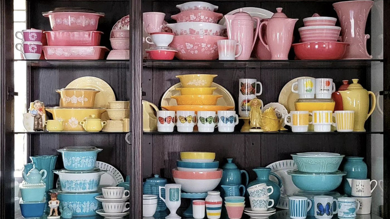 Vintage collections displayed in china cabinet