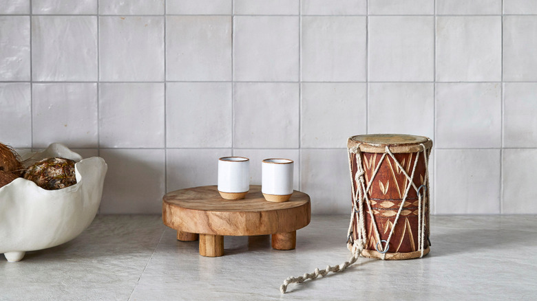 Zellige tile in white kitchen with wood rise and white ceramic bowl