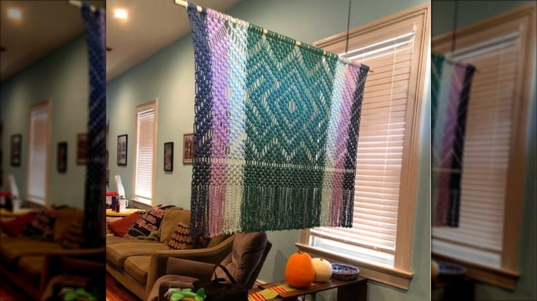 Textile woven hanging used as room divider