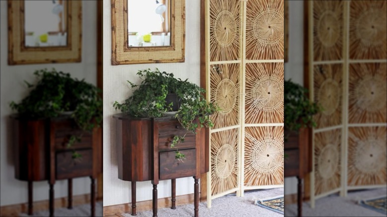 A rattan privacy screen in entryway