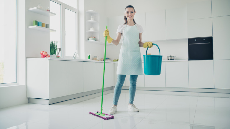 woman mopping the floor