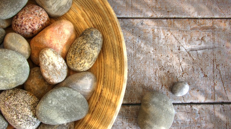 bowl filled with river rocks