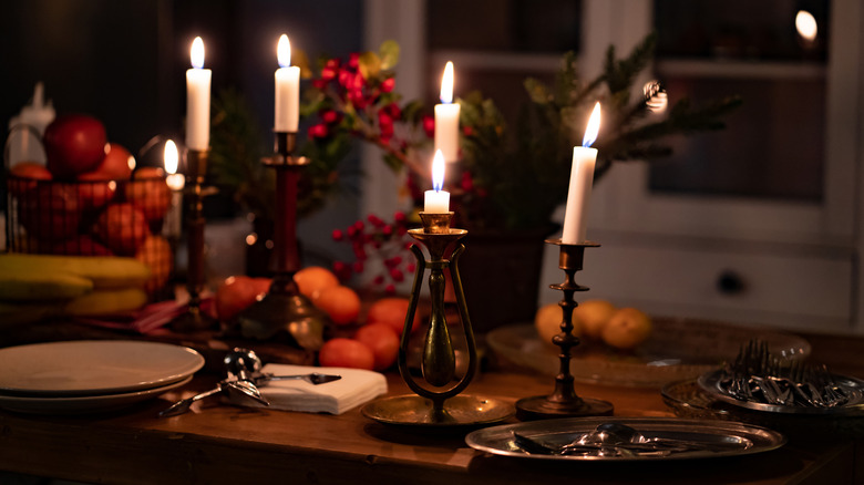 Multiple candles on dining table