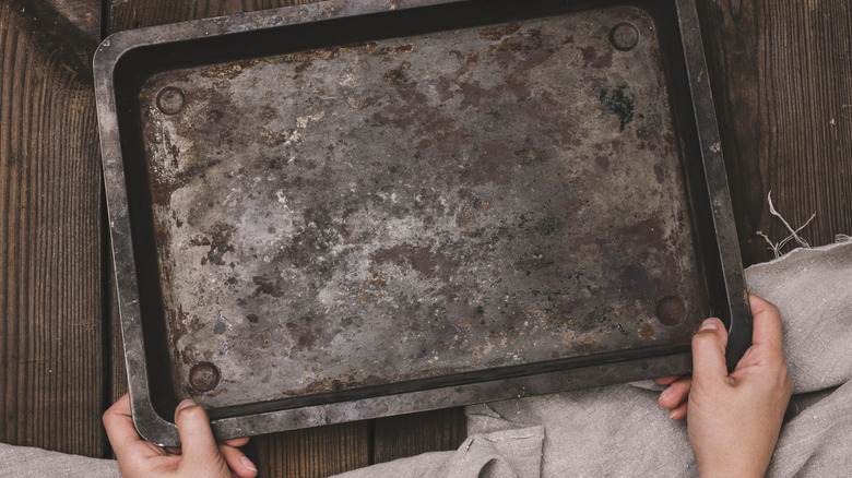 A well-seasoned baking tray on a table.