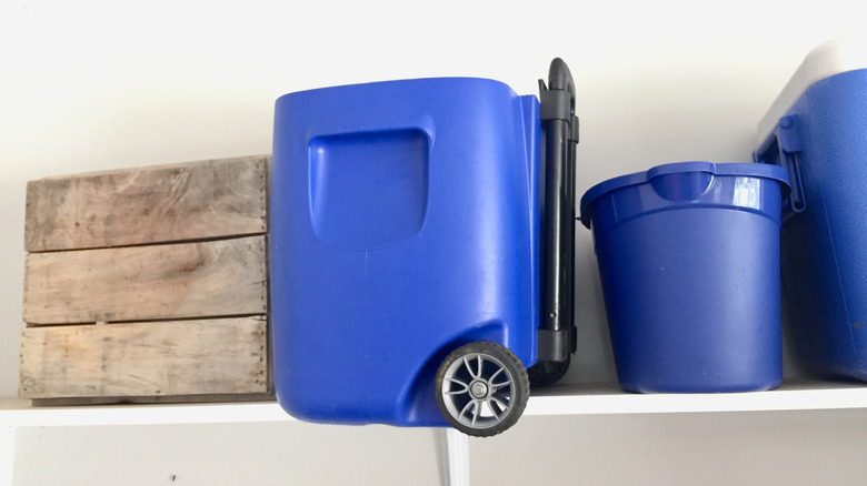 blue cooler on garage shelf