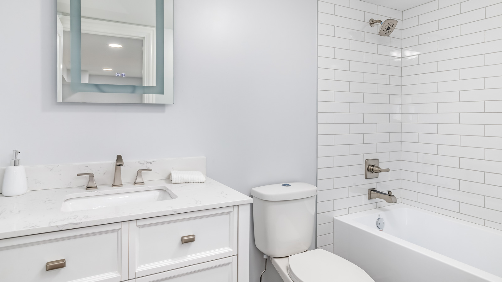 A Design Expert Explains How To Add Warmth To Your All White Bathroom