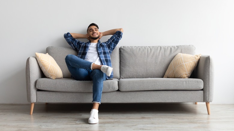 man sitting on a couch