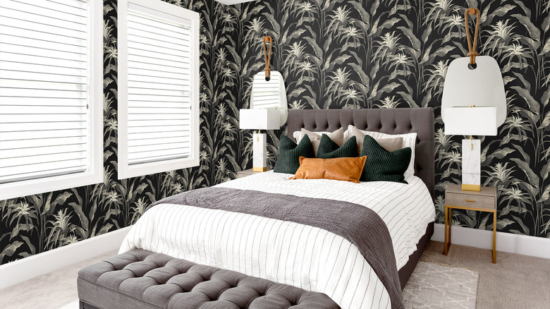 Bedroom with bold wallpaper