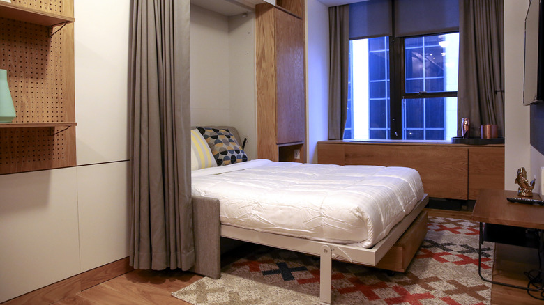 Murphy bed in studio apartment