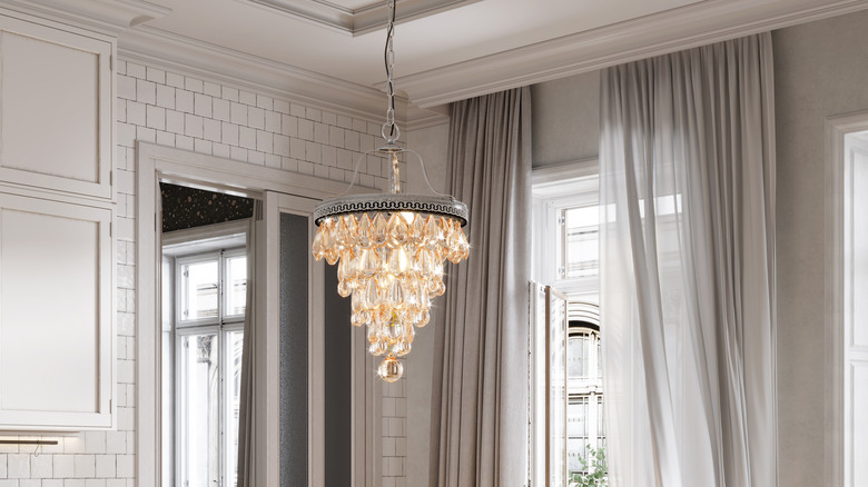 chandelier hanging in a kitchen