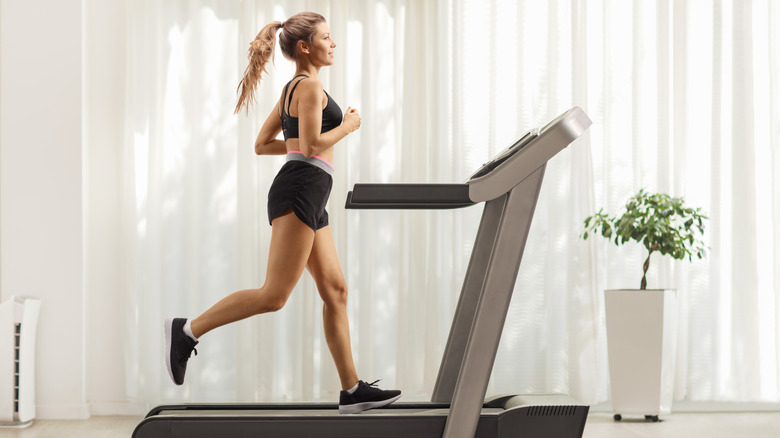 Woman working out on treadmill