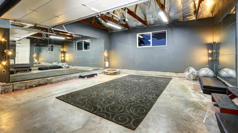 Basement gym with mirror