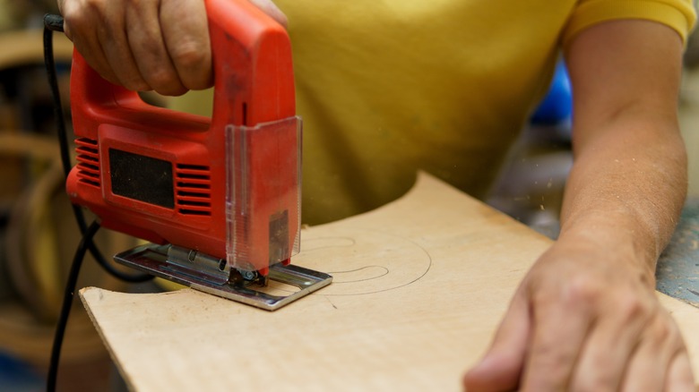 cutting wood with jigsaw