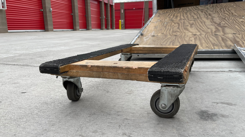 wheeled furniture dolly platform on concrete surface