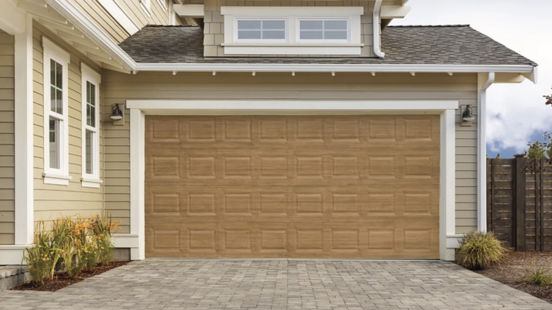 A faux wood garage door