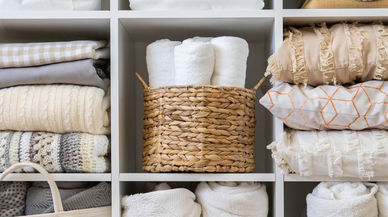 Linen closet with baskets