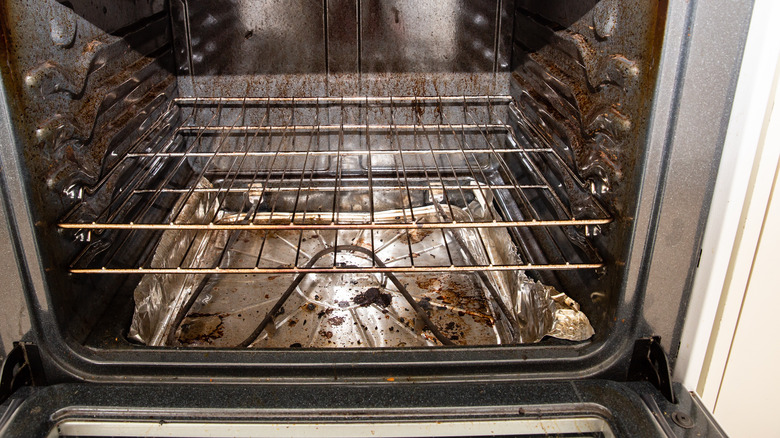 The inside of very dirty oven