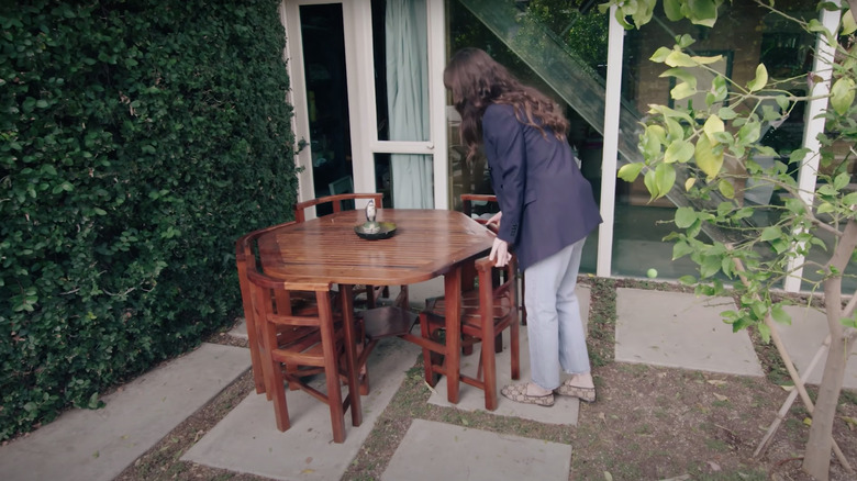 Dakota Johnson's wooden outdoor table