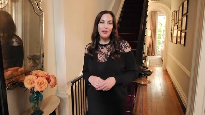 Liv Tyler in the foyer of her brownstone