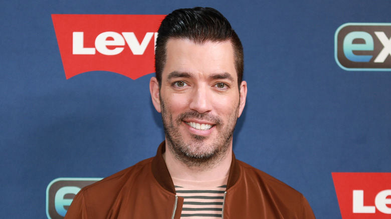 Drew Scott smiling at an event