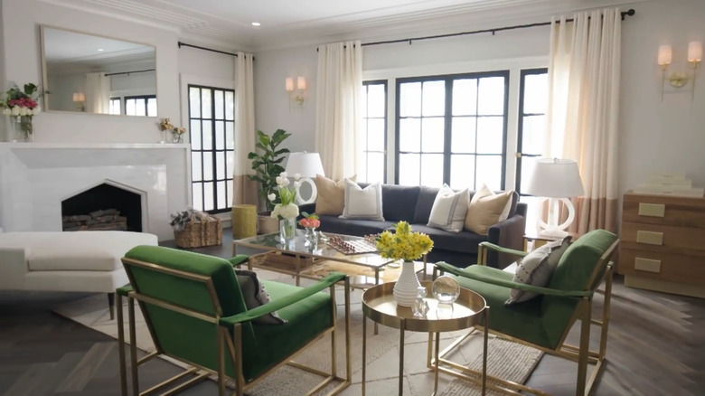 Drew Scott and Linda Phan's living room with green chairs