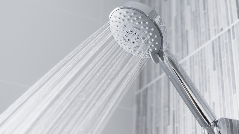 Showerhead dispersing water