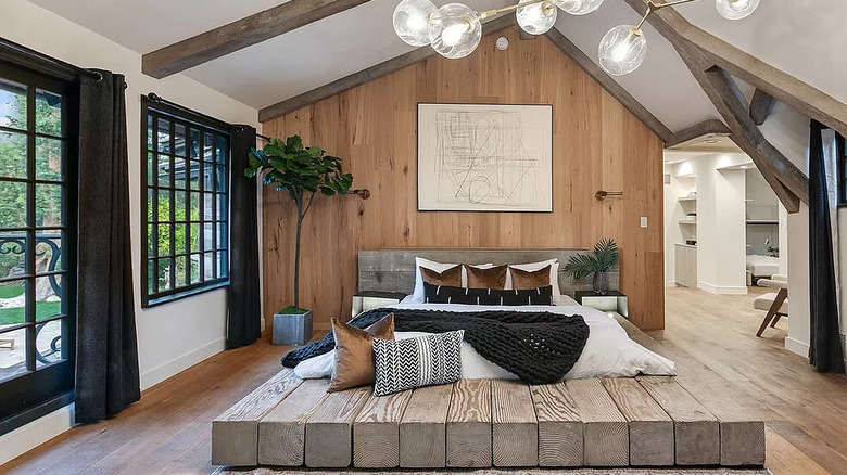 master bedroom with wood decor