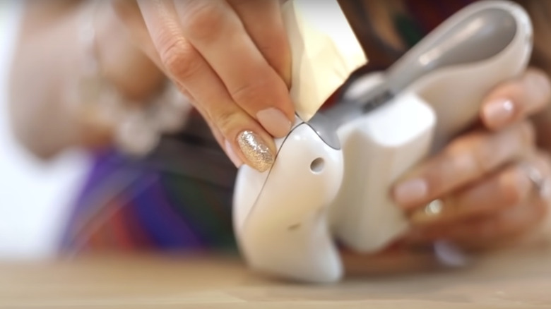 Cleaning game controller with sticky note