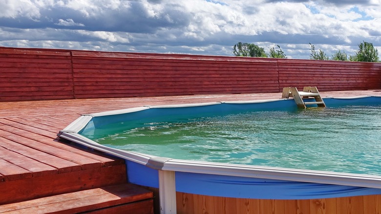 Pool surrounded by wood decking